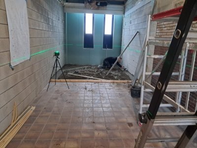 15 december Zand cement vloer met afschot voor douches